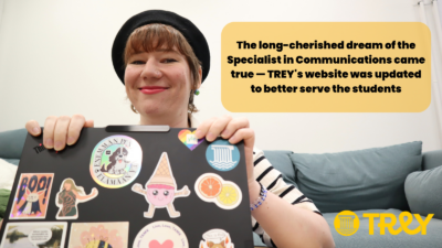 Saana, TREY Specialist in Communications and Advocacy is smiling with her laptop